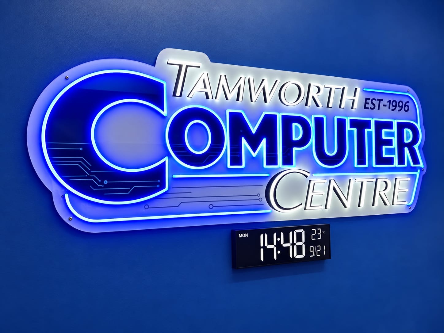 Illuminated blue Tamworth Computer Centre sign, established 1996